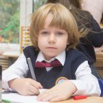 A Riverside School pupil working at a desk